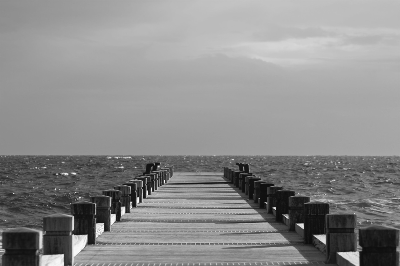 A dock leading to a body of water
